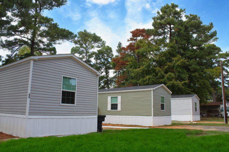 Three manufactured homes in a neighborhood