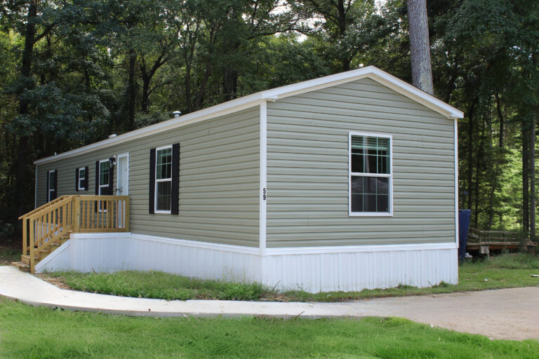 a house with a porch and a lawn